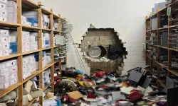 Hırsızlar tasarruf bankası kasasına delik açtı