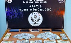 Kendisini polis olarak tanıtan dolandırıcılar yakalandı