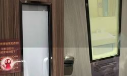 Çin'de sıra dışı önlem: Sigara içildiği an tuvalet kapısı şeffaflaşıyor