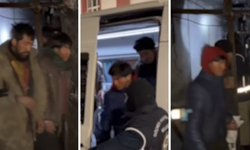 Kars'ta metruk binaya baskın: 14 göçmen yakalandı