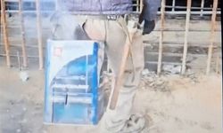 Soğukla ilginç mücadele: İnşaat işçisinden tenekeli ısınma sistemi