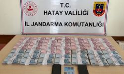 Sahte kimlikle kendini savcı ve polis olarak tanıtan dolandırıcıları aç gözlülükleri ele verdi