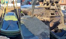 Rus iş insanı lüks BMW'sini gömüp üzerine beton döktü