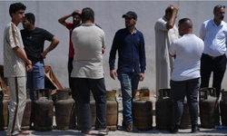 Bağdat seneler öncesine gitti: Yemek pişirmek için metrelerce kuyruk