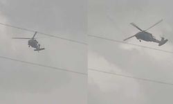 Dolu ve yağmura yakalanan askeri helikopter zor anlar yaşadı