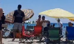Şemsiye kurmak istedi, ortalık savaş alanına döndü!