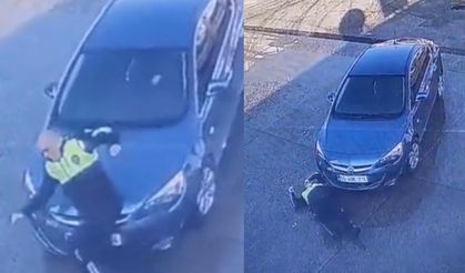 Gözünün önünde yürüyen polisi görmedi! Dikkatsiz sürücünün çarpma anı kamerada