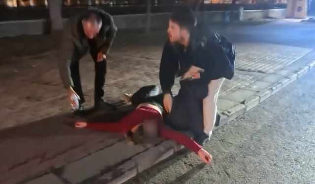 Kaldırıma yatıp çığlık attı, polisi görünce kaçmak istedi