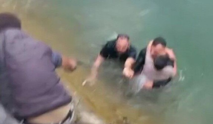 Sulama kanalına düşen çocuğu kurtarmak için zamanla yarıştılar