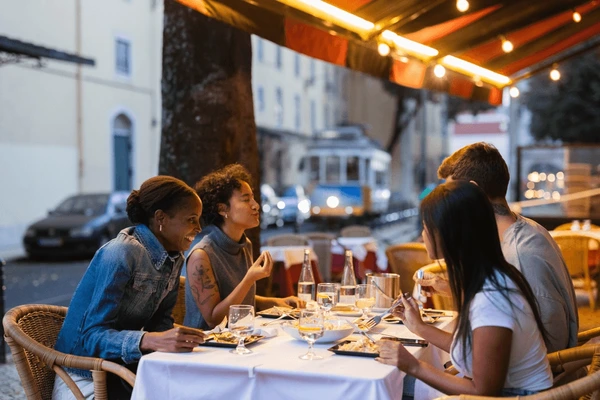 Four Friends Happily Eating Dinner 600Nw 2590478227